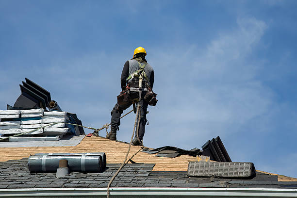 Professional Roof Replacement technician working in Boxborough, MA
